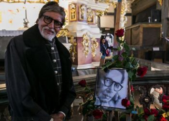 Big B prays for his father at one of Europe's oldest church