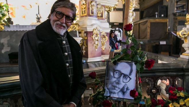 Big B prays for his father at one of Europe's oldest church