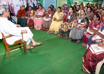 File photo of CM Naveen Patnaik interacting with SHG members