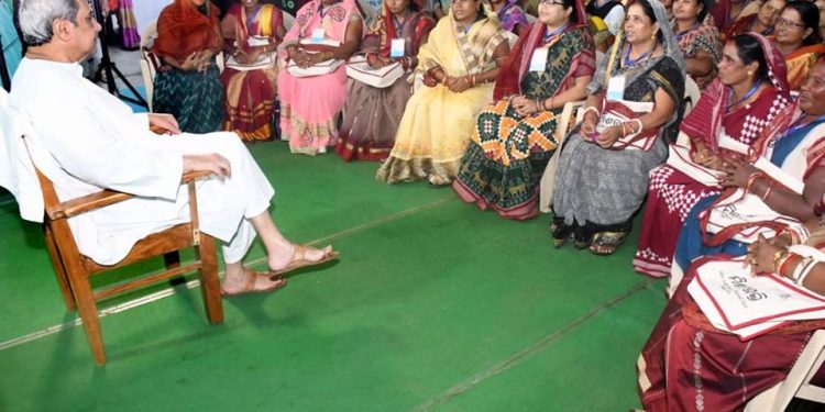 File photo of CM Naveen Patnaik interacting with SHG members