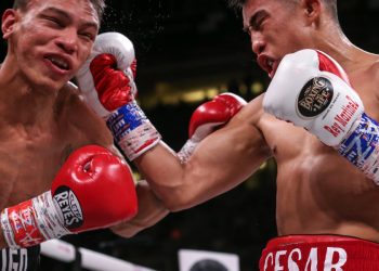 December 20, 2019; Phoenix, AZ, USA; Julio Cesar Martinez Aguilar and Cristofer Rosales during their December 20, 2019 Matchroom Boxing USA bout at the Talking Stick Resort Arena in Phoenix, AZ.  Mandatory Credit: Ed Mulholland/Matchroom Boxing USA