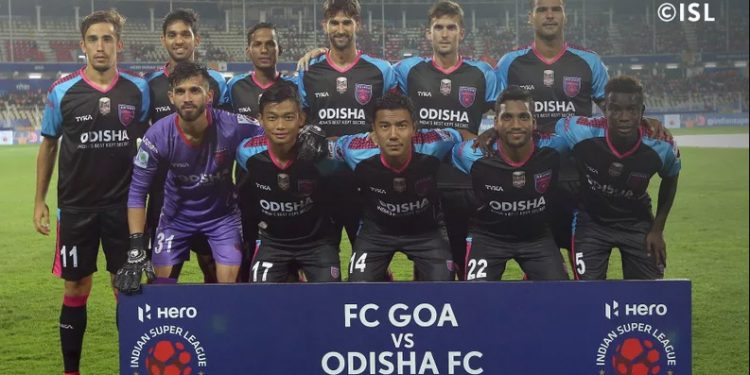 Odisha FC players pose before their game against FC Goa