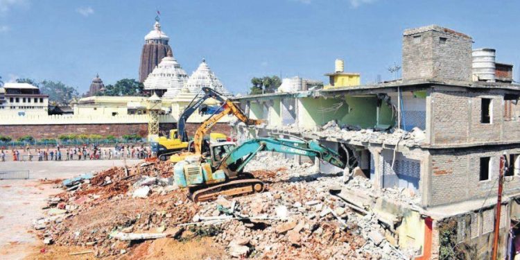 File photo of earthmovers engaged by Puri administration razing Mangu Mutt