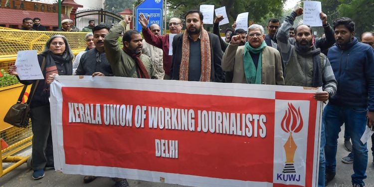 Members of the Kerala Union of Working Journalists with CPI(M) leader Sitaram Yechury.