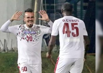 Daniel Cyrus (back to camera) celebrates with a teammate after scoring the winning goal, Thursday