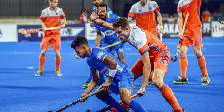 Tense midfield action during the India-Netherlands tie at the Kalinga Stadium in Bhubaneswsar, Sunday