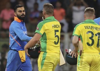 Virat Kohli congratulates Aaron Finch after the first ODI in Mumbai