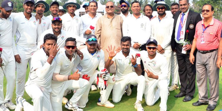Odisha cricketers pose for a group photo after their win over Assam, Thursday