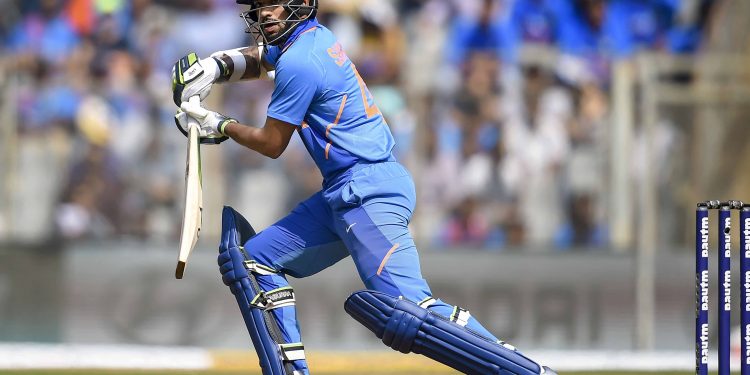 Shikhar Dhawan who top scored for India drives during the match against Australia