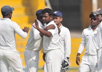 Suryakant Pradhan (third from right) picked up 11 wickets against Haryana and was adjudged man of the match