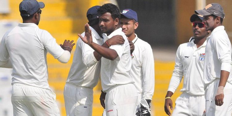 Suryakant Pradhan (third from right) picked up 11 wickets against Haryana and was adjudged man of the match