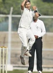 Left-arm spinner Tinu Kundu