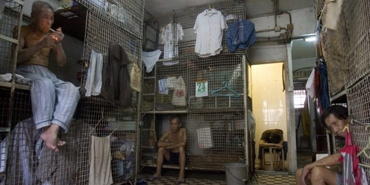 Here people live in iron cages like animals