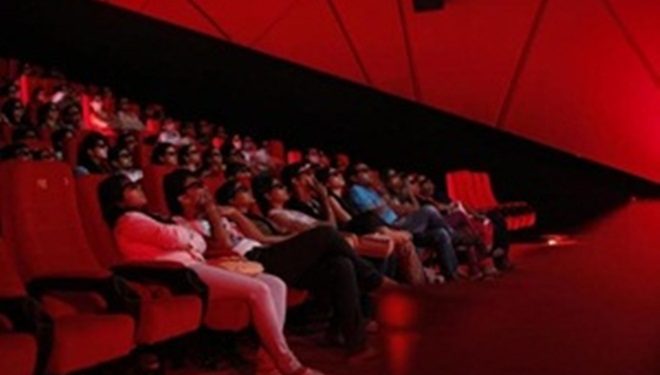 Cinema-goers wearing 3D glasses watch a movie at a PVR Multiplex in Mumbai November 10, 2013. REUTERS/Danish Siddiqui/Files