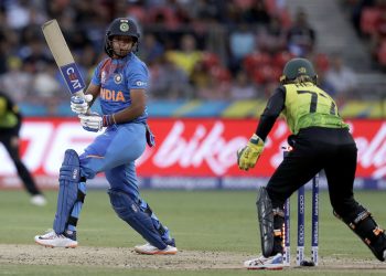 Sydney: India's Harmanpreet Kaur, left, turns to see she is stumped accidentally by Australia's Alyssa Healy during the first game of the Women's T20 Cricket World Cup in Sydney, Friday, Feb. 21, 2020.