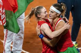 Aryna Sabalenka and Aliaksandra Sasnovich celebrate Belarus' place in the Fed Cup finals (AFP Photo/Ronald HOOGENDOORN)