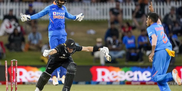 Yuzvendra Chahal sends Martin Guptill's bails flying during the 3rd ODI, Tuesday