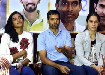 Pullela Gopichand with PV Sindhu (left) and Saina Nehwal