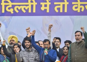 Arvind Kejriwal with family members and AAP leaders celebrate the party's victory Tuesday