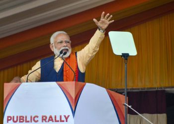 Prime Minister Narendra Modi addresses a public rally during an event to celebrate the signing of the Bodo agreement, in Kokrajhar, Assam