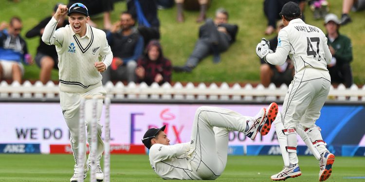 Ross Raylor (on ground) made his 100th Test memorable by catching Virat Kohli