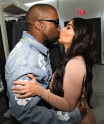Kim Kardashian caught kissing hubby Kanye in public
