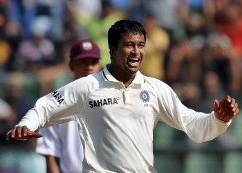 Indian bowler Pragyan Ojha celebrates after taking wicket of West Indies batsman Marlon Samuels during fifth day play of the third Test cricket match between India and the West Indies at The Wankhede stadium in Mumbai on November 26, 2011. AFP PHOTO/Punit PARANJPE (Photo credit should read PUNIT PARANJPE/AFP/Getty Images)
