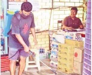 Prabir Haldar sanitising shops