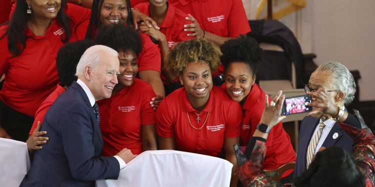 Joe Biden (left) in a fund-raising programme Sunday