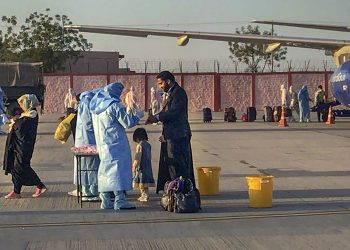 TWITTER IMAGE POSTED BY @PRODefRjsthn ON SUNDAY, MARCH 29, 2020, Jodhpur: Medics screen passengers, who were airlifted from Iran, before being sent for a mandatory isolation period to an Indian Army Wellness Facility in Jodhpur. (PTI Photo)