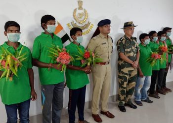 Malkangiri SP Rishikesh D Khilari and other officials with the seven Maoists who surrendered