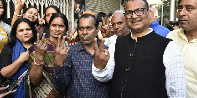 Nirbhaya's parents (2nd and 3rd from left) flash the 'V' sign after the hanging of the convicts
