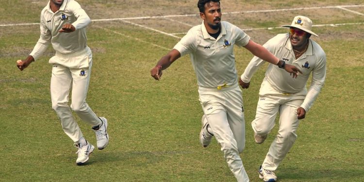 Kolkata: Bengal bowler Ishan Porel celebrates with his teammates after the dismissal of Karnataka opener KL Rahul (unseen) during the 3rd day of Ranji Trophy semi-final match, at Eden Gardens in Kolkata, Monday, March 2, 2020. (PTI Photo/Swapan Mahapatra)