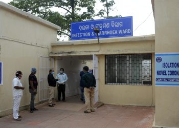 Doctors and medical staffs are working overtime at Corona virus ODD at Capital Hospital in Bhubaneswar on Sunday during 48hours complete shutdown in Bhubaneswar on Sunday.