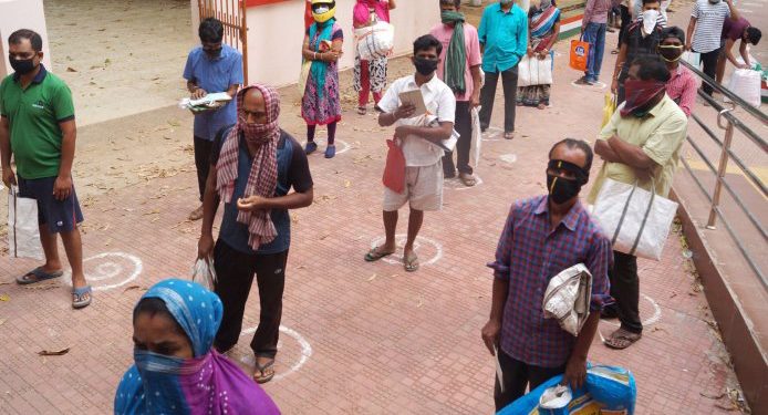 Social distancing in front of a shop in Bhubaneswar