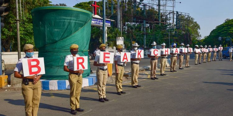 Bengaluru: Policeman hold placards as part of an awareness programme on COVID 19, during a nationwide lockdown imposed in the wake of coronavirus pandemic, in Bengaluru, Thursday, April 2, 2020. (PTI Photo/Shailendra Bhojak)(PTI02-04-2020_000206B)