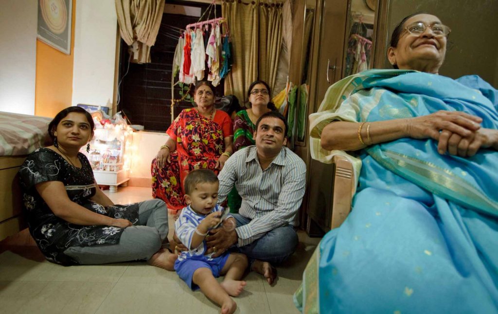 families watching Ramayan at home