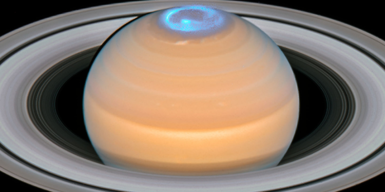 What makes Saturn's upper atmosphere so hot
