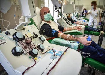 Mandatory Credit: Photo by MATTEO CORNER/EPA-EFE/Shutterstock (10604430c)
A patient recovered from COVID-19 coronavirus undergoes to a plasma sampling that will be used for transfusions to positive patients at the Policlinico San Matteo hospital in Pavia, Italy, 06 April 2020. Countries around the world are taking increased measures to stem the widespread of the SARS-CoV-2 coronavirus that causes the Covid-19 disease.
Coronavirus in Italy, Pavia - 06 Apr 2020