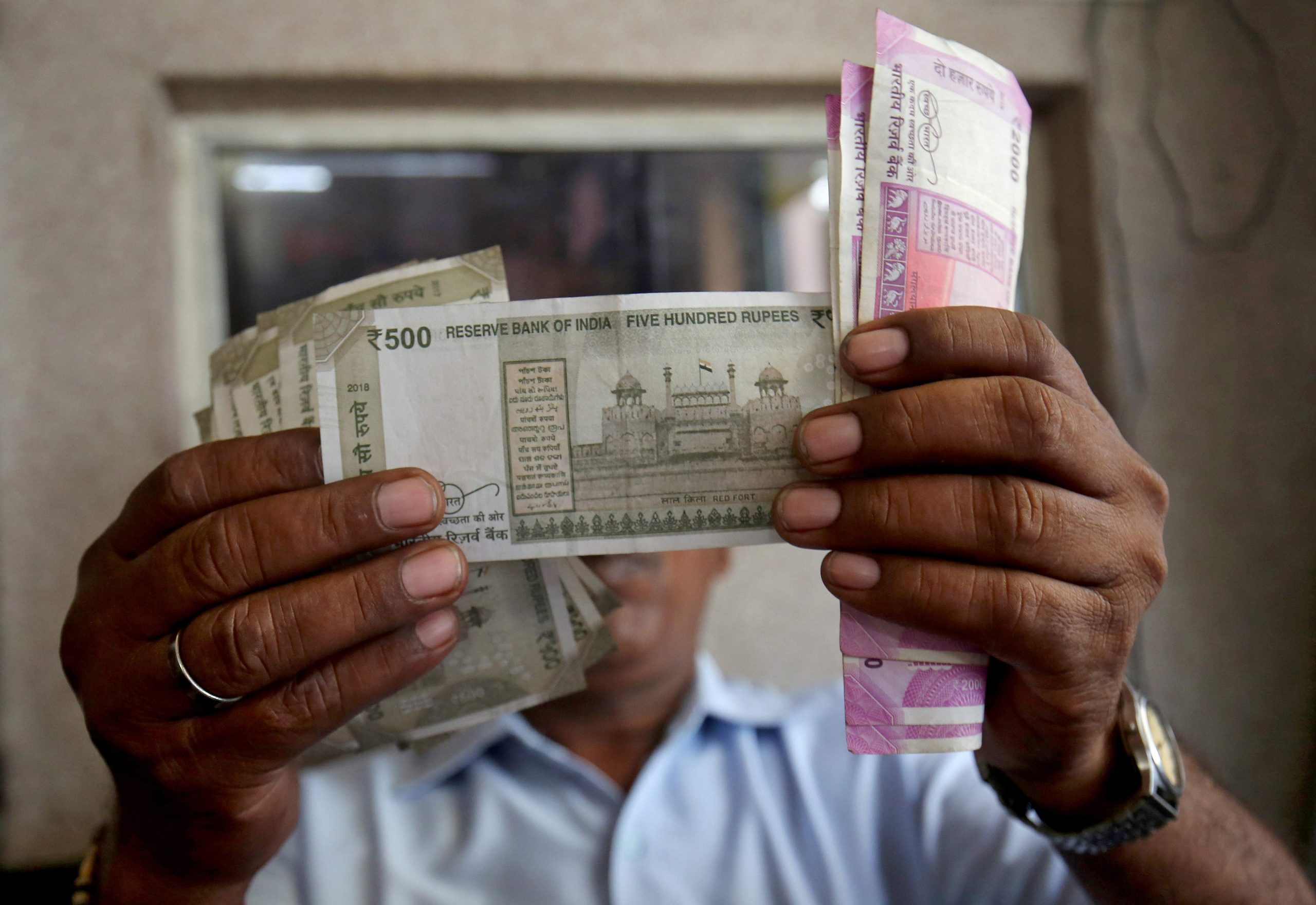 Rupee slips 5 paise to close at 74.79 against US dollar - OrissaPOST