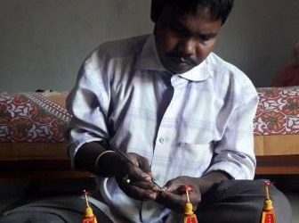 Three-inch high chariots with deities atop attract devotees in Khurda