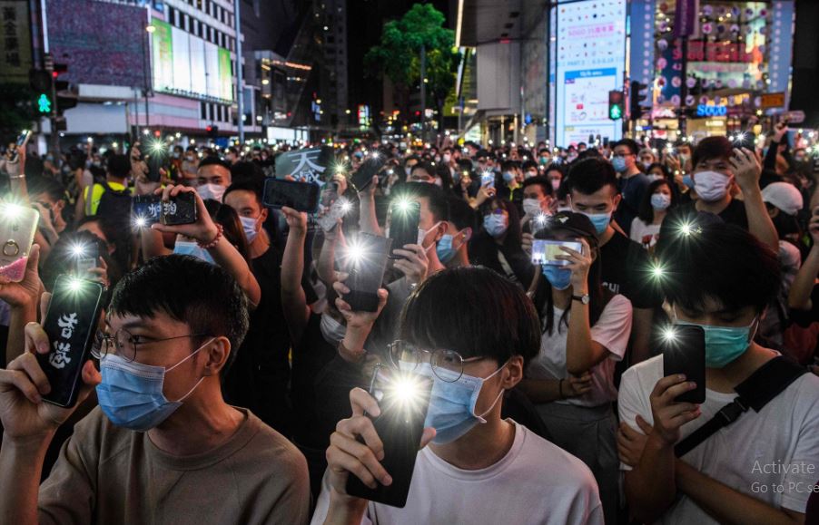 Hong Kongers hold first protest in years under strict rules