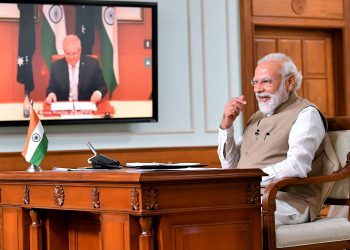 New Delhi: Prime Minister Narendra Modi during his first-ever virtual summit with his Australian counterpart Scott Morrison (on the screen), In New Delhi, Thursday, June 4, 2020. (PIB/PTI Photo)