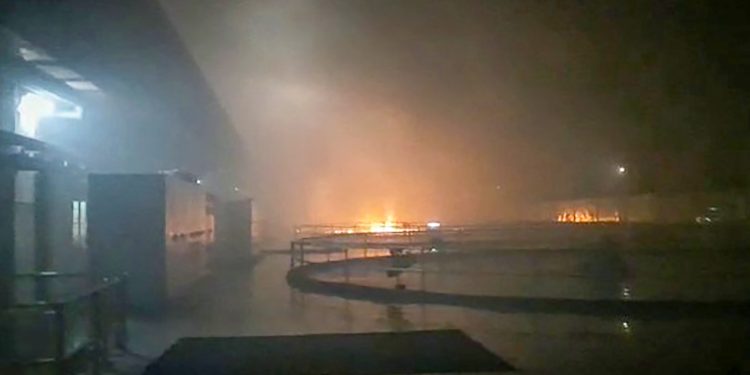 **EDS: BEST QUALITY AVAILABLE** Kurnool: Smoke billows from a fire at Srisailam Left Bank Power Station (SLBP), in Kurnool district, Thursday night, Aug. 20, 2020. (PTI Photo)(PTI21-08-2020_000026B)