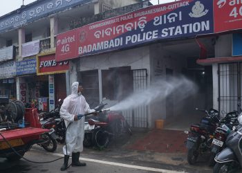 A Fire Service personnel sanitises Badambadi police station in Cuttack, Sunday