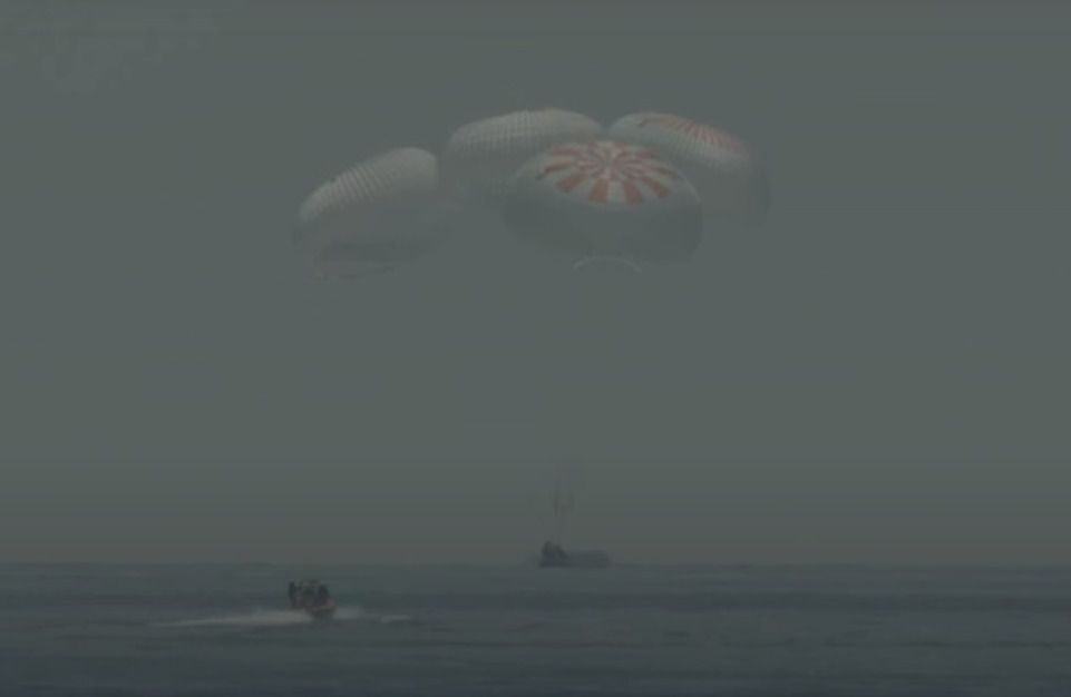 Nasa SpaceX crew return: Dragon capsule splashes down