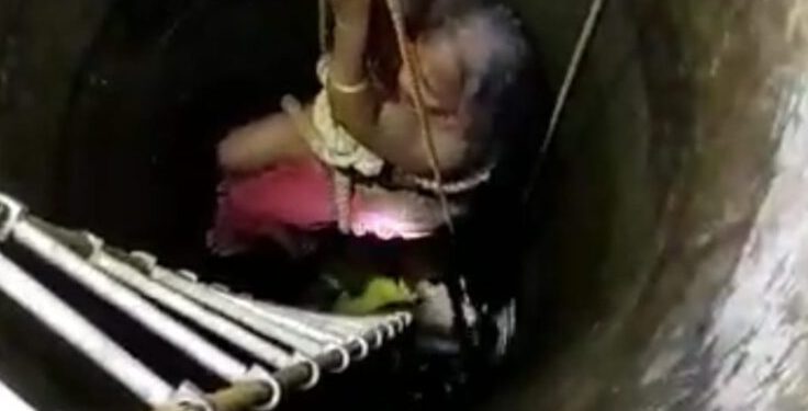 Watch video 75 year old woman, son rescued from 40-ft deep well by fire fighters in Ganjam