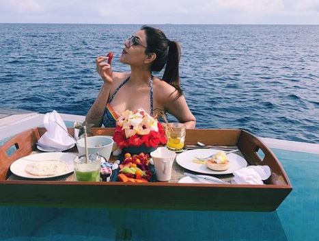 Kajal Aggarwal enjoying with her husband in Maldives, shares photo of having breakfast by the swimming pool