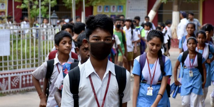 File photo of children coming out of a state-run school in Bhubaneswar. (Pic: Bikash Nayak)