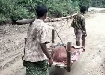 Bad road condition Elderly woman patient carried on cot in Malkangiri